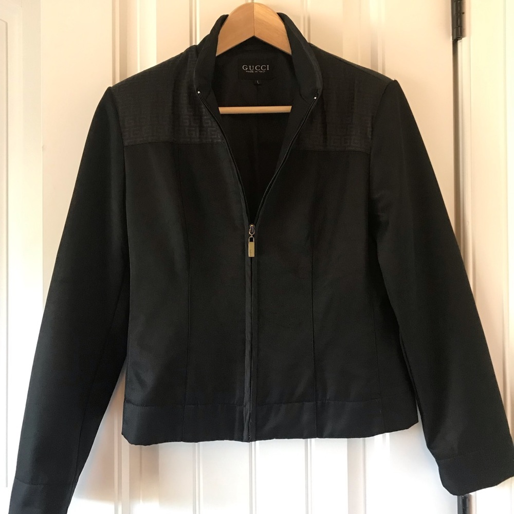 Gucci black jacket with elbow/shoulder detail.